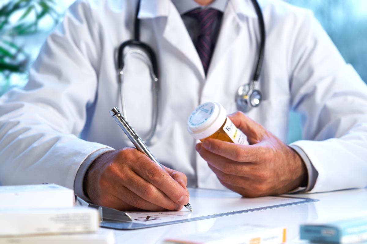 A doctor authoring facts about prescription drugs