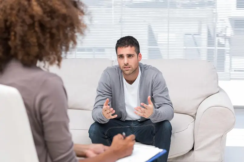 man talking to his therapist
