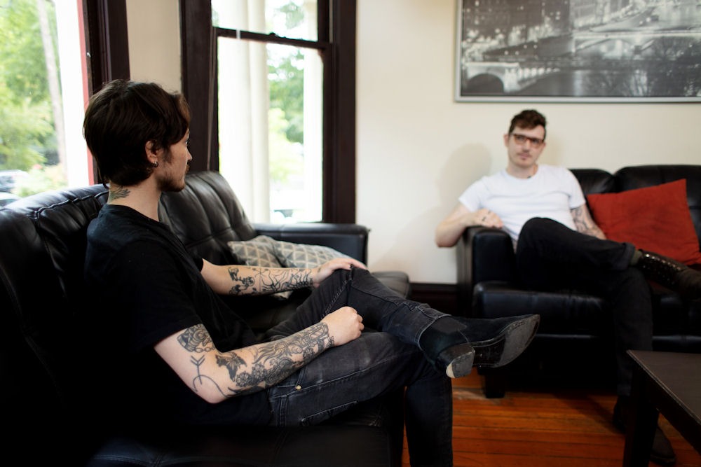 two men sitting on therapy couches at Crestview's residential rehab