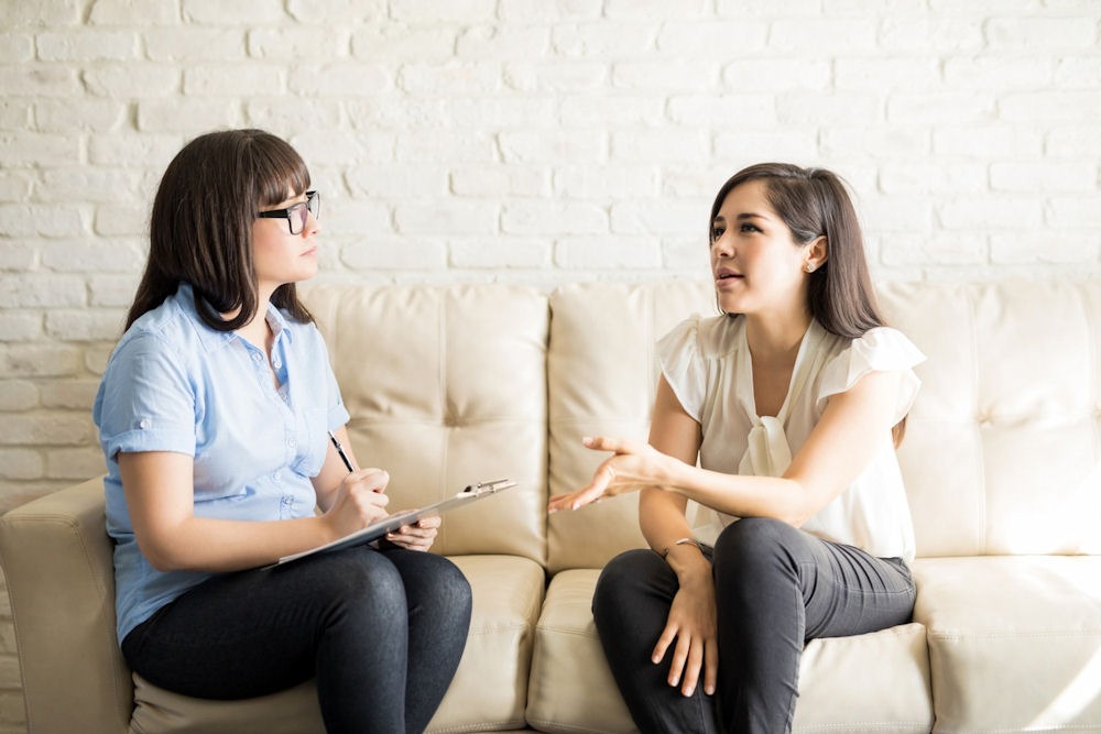 woman talking to her therapist