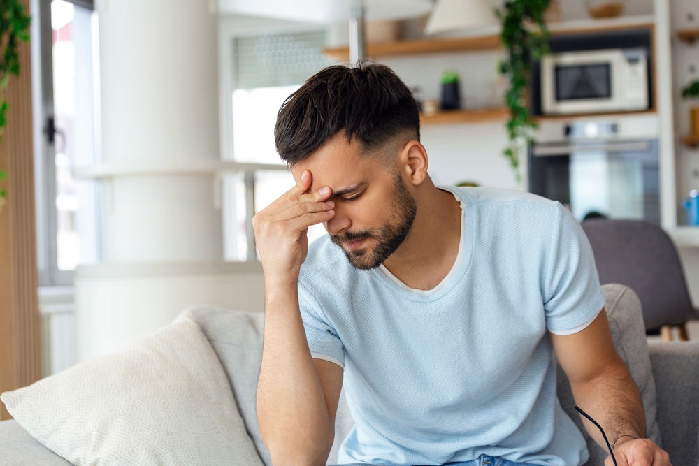 man feeling stressed