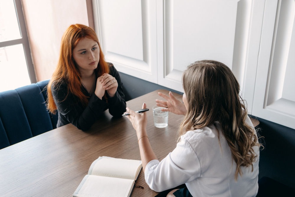 two women discussing health