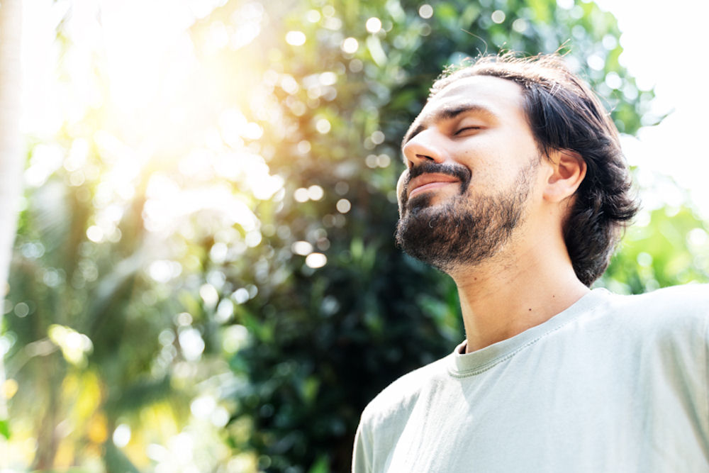 man smiling outside