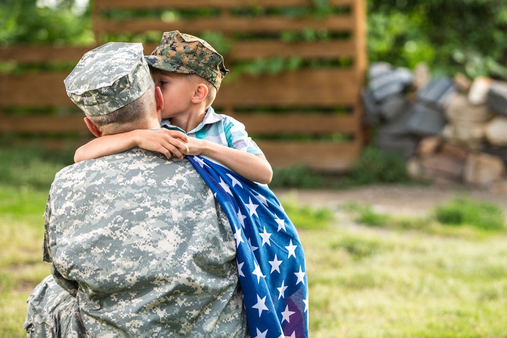 active duty service member with their child