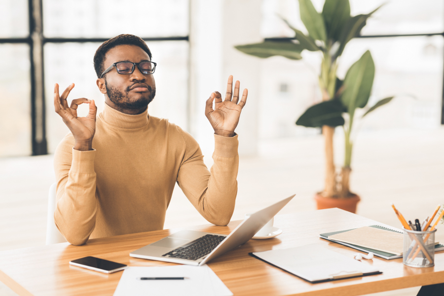 Man relaxing and practicing mindfulness