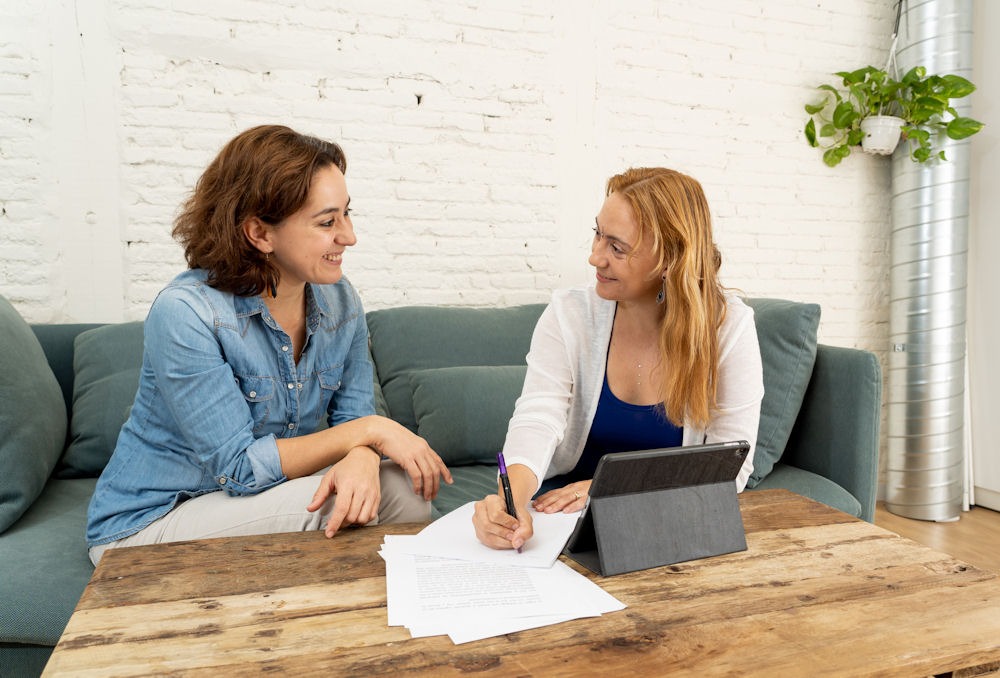 two women discussing recovery